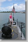 IMG_1724 * Sandi standing at the aft of the USS Bowfin.