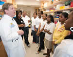 Students visit Stephen Gruber's lab on the UM Ann Arbor campus.