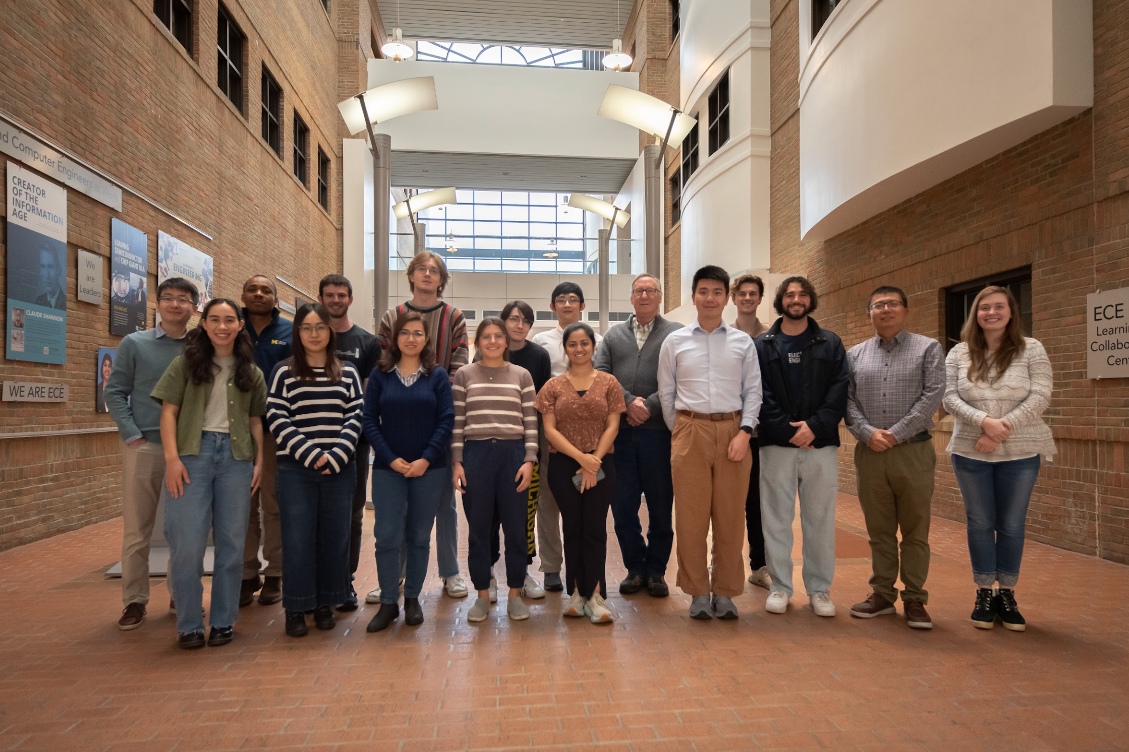 The OCM group in winter inside the atrium of  the EECS building.