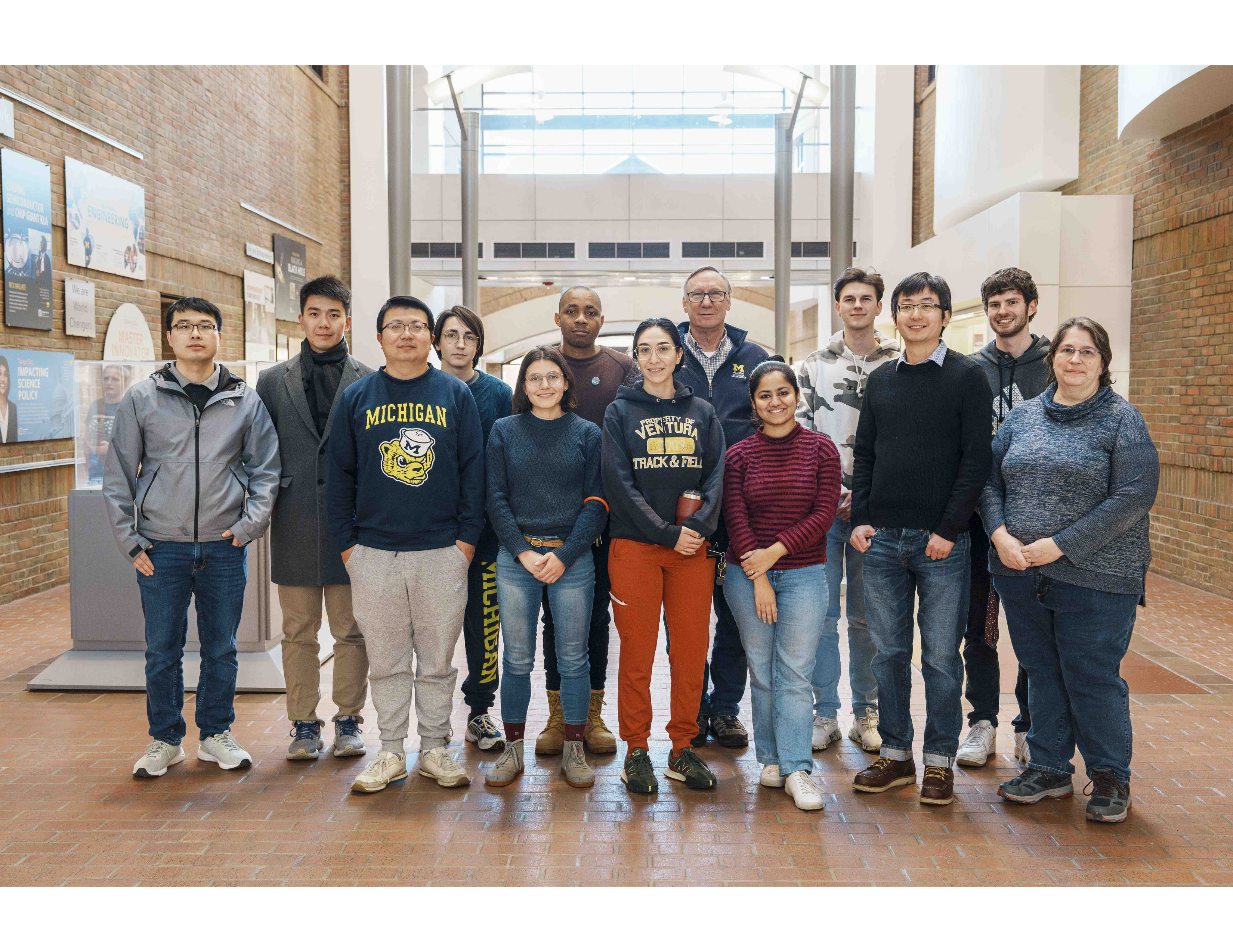 The OCM group in winter inside the atrium of  the EECS building.