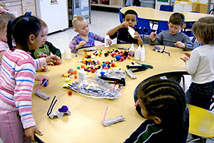 Children making caterpillars