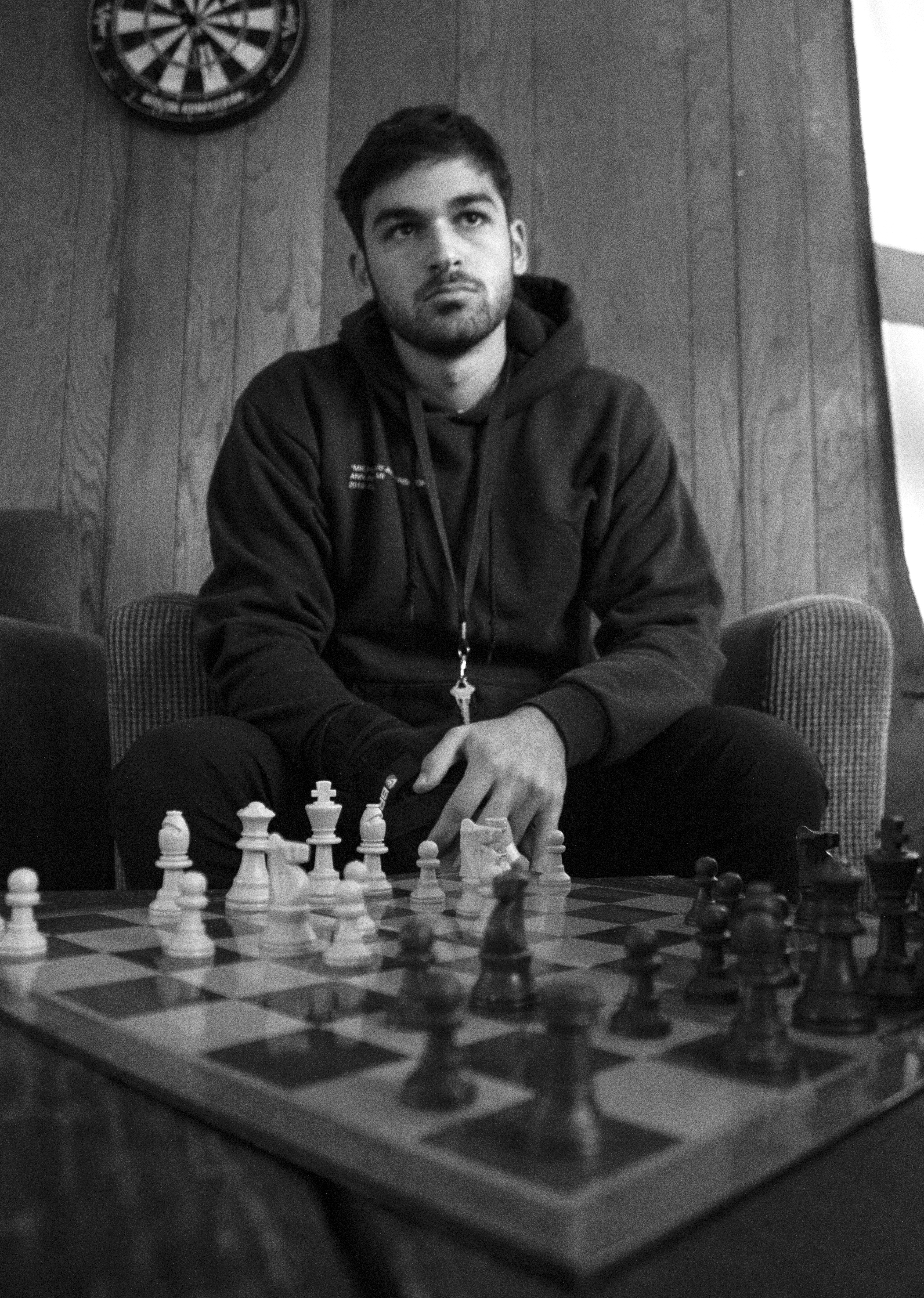 Yousef Kobeissi deciding the next move in a chess game.