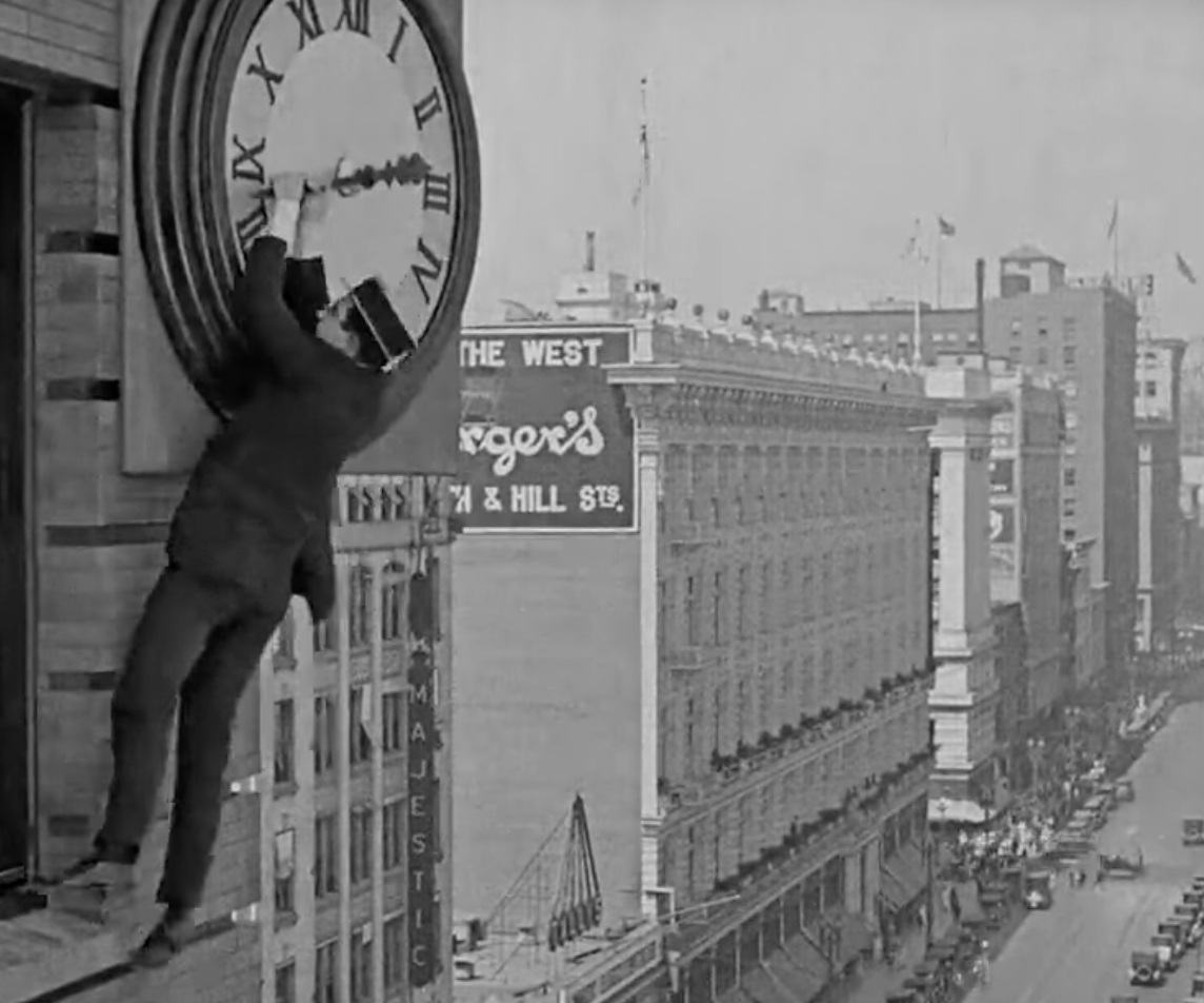 'Safety Last' hanging by two hands from clock