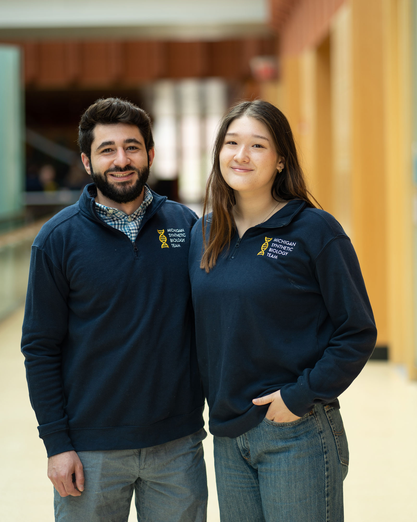 Graduate advisor, Kareem Aboulhosn, and Finance Director, Kimi Lillios, smiling.