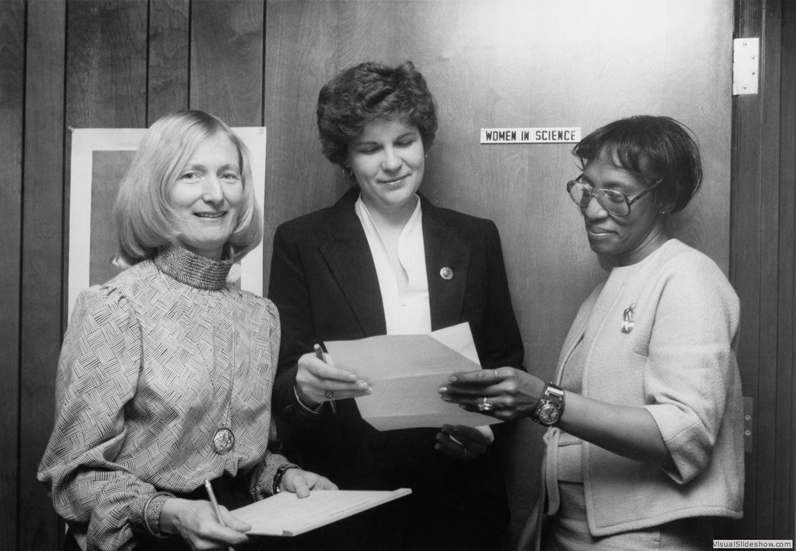 Left to right: Barbara Sloat, Sally Dunnick (WIS Program Assistant), and Addie Hunter (CEW/WIS Secretary) at the Women In Science office at Center for the Education of Women, 1983