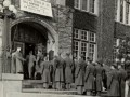 Company B-4 entering the Union at chow time, 1943<br/>Despite many advancements around campus, women still could not enter through the front door of the Michigan Union except on football Saturdays.